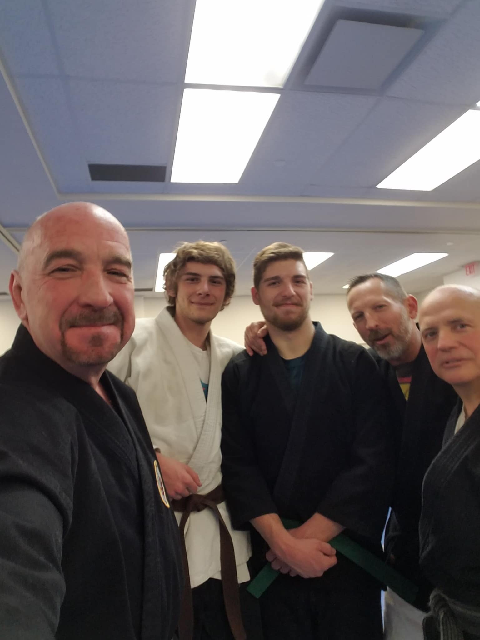 Group karate training session at Arma Defense OKC